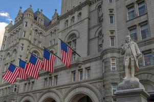 Old Post Office building with Benjamin Franklin Statue, Washington DC, United States photo