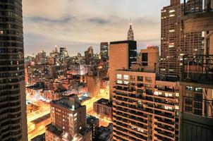 Apartments along the New York City east side skyline unto the East River photo