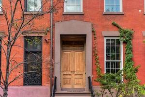 Classic Greek Revival Townhouse architecture in Greenwich Village in New York City. photo