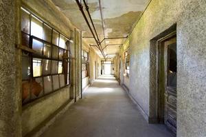 The abandoned Ellis Island Immigrant Hospital. It was the United States first public health hospital, opened in 1902 and operating as a hospital until 1930. photo