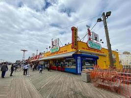 New York City - May 25, 2020 -  Nathan's Restaurant on the Coney Island Boardwalk with social distancing on Memorial Day 2020. photo