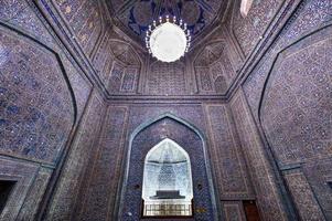 Khiva, Uzbekistan - Jul 13, 2019 -  Pahlavan-Mahmud Mausoleum in Khiva, Uzbekistan. Done in the tradition of Khorezm architecture of XVIII-XIX centuries. photo