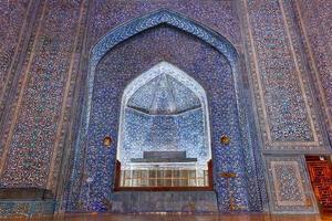 Khiva, Uzbekistan - July 14, 2019 -  Pahlavan-Mahmud Mausoleum in Khiva, Uzbekistan. photo