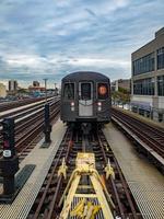 New York City - September 16, 2019 -  B Train on the track at Ocean Parkway in the Brighton Beach neighborhood of Brooklyn, New York. photo