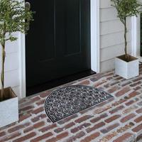 Designer Welcome Entry Doormat Placed on Solid Brick Floor Outside Entry Door with Plants