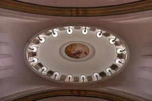 Moscow, Russia - June 28, 2018 -  Interior of the metro station Mayakovskaya in Moscow, Russia. It holds a title of one of the most beautiful metro stations in the world. photo