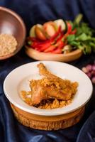 fried chicken wings on dish. Indonesia food photo
