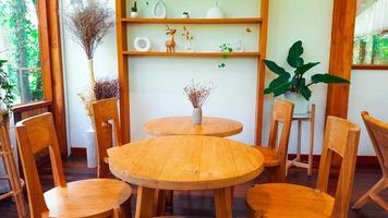 Brown wooden table set on wooden floor photo