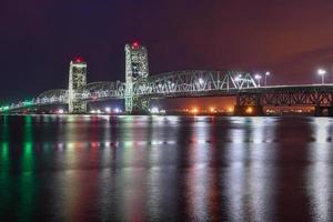 Marine Parkway-Gil Hodges Memorial Bridge as seen from Rockaway, Queens at night. Built and opened in 1937, it was the longest vertical-lift span in the world for automobiles. photo