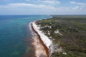 Aerial panoramic view of the beaches along the coast of Tulum, Mexico.