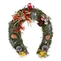 Christmas wreath made of moss in the shape of a horseshoe isolated on white background photo