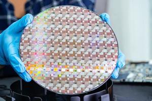 Silicon wafer for manufacturing semiconductor of integrated circuit. photo