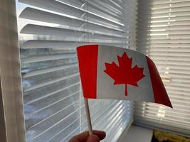 Canada country flag in winter season photo