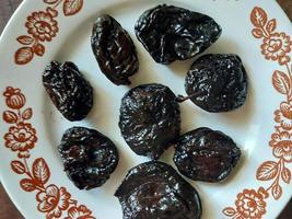 Prunes dried plum healthy food photo