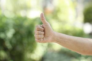 illustration of thumb finger symbol to indicate success or success photo