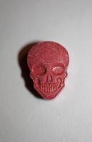 Purple skull world's strongest ecstasy pills close up background high quality big size dope prints photo