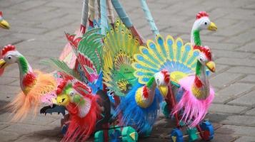 Indonesian children's traditional toy, shaped like an animal with wheels photo