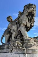 Detail of art on the Alexander III bridge in Paris, France. photo