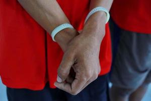 Man handcuffed hands. Prisoner or arrested. photo