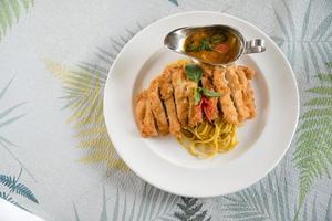 Delicious curry with pork cutlet thai food photo