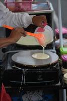 Food vendors who make famous Malaysian Indonesian food are called leker, leker is a take away food that is popular among Malaysians Indonesia. Making process photo