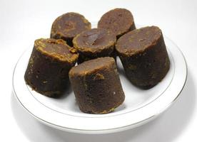 java sugar or palm sugar or brown sugar in cube in store. photo