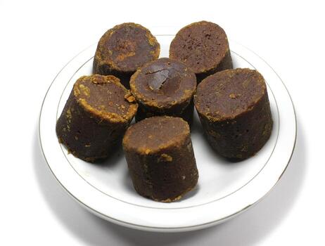 java sugar or palm sugar or brown sugar in cube in store. photo