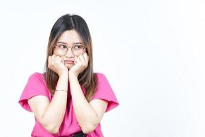 Sad Looking upset, sulking and frowning Of Beautiful Asian Woman Isolated On White Background photo