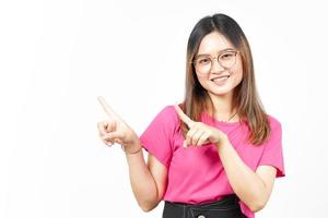 Showing Product and Pointing Side Of Beautiful Asian Woman Isolated On White Background photo