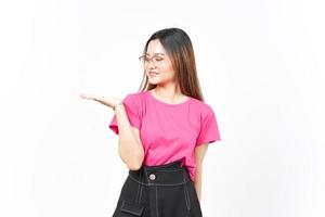Showing and Presenting Product on Open Palm Of Beautiful Asian Woman Isolated On White Background photo