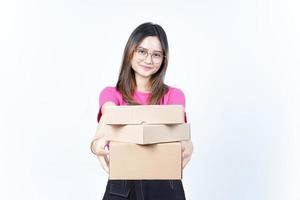 Holding Package Box or Cardboard Box Of Beautiful Asian Woman Isolated On White Background photo
