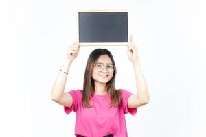 Showing, Presenting and holding Blank Blackboard Of Beautiful Asian Woman Isolated On White photo