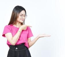 Showing and Presenting Product on Open Palm Of Beautiful Asian Woman Isolated On White Background photo