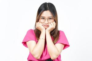 Sad Looking upset, sulking and frowning Of Beautiful Asian Woman Isolated On White Background photo