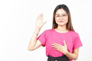 Swearing gesture Of Beautiful Asian Woman Isolated On White Background photo