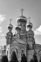 Christian church cross in high steeple tower for prayer photo