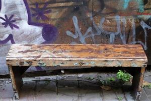 Bench for rest in the city park on the seashore. photo