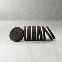 Galletas oreo de renderizado 3d sobre fondo de hormigón foto