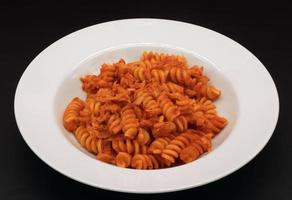 Fusilli with tuna, Fusilli al tonno. Traditional Italian pasta. photo