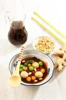 Wedang Ronde Jahe is Glutinous Rice Balls with Ginger and Palm Sugar Syrup. photo