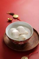 Tangyuan, Sweetened Glutinous Black Sesame Ball Soup. Eaten During Lantern Festival, Wedding, and in Winter Solstice photo