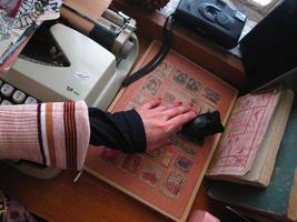 Vintage Desk Top Setting With Typewriter and Old Books In Karachi Pakistan 2022 photo