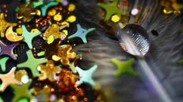 Close-up Of water drop with glitter on it in different colorful loghts in Karachi Pakistan 2022 photo