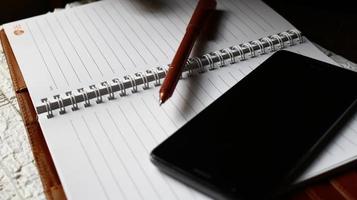 Work Bag And Office Diary On Table in Karachi Pakistan 2022 photo