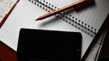 Work Bag And Office Diary On Table in Karachi Pakistan 2022 photo