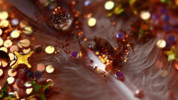 Close-up Of water drop with glitter on it in different colorful loghts in Karachi Pakistan 2022 photo