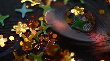 Close-up Of water drop with glitter on it in different colorful loghts in Karachi Pakistan 2022 photo