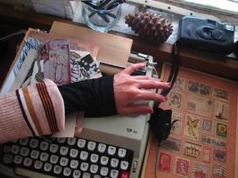 Vintage Desk Top Setting With Typewriter and Old Books In Karachi Pakistan 2022 photo