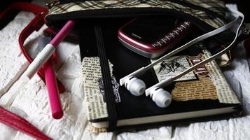 Work Bag And Office Diary On Table in Karachi Pakistan 2022 photo