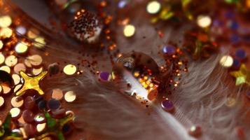 Close-up Of water drop with glitter on it in different colorful loghts in Karachi Pakistan 2022 photo